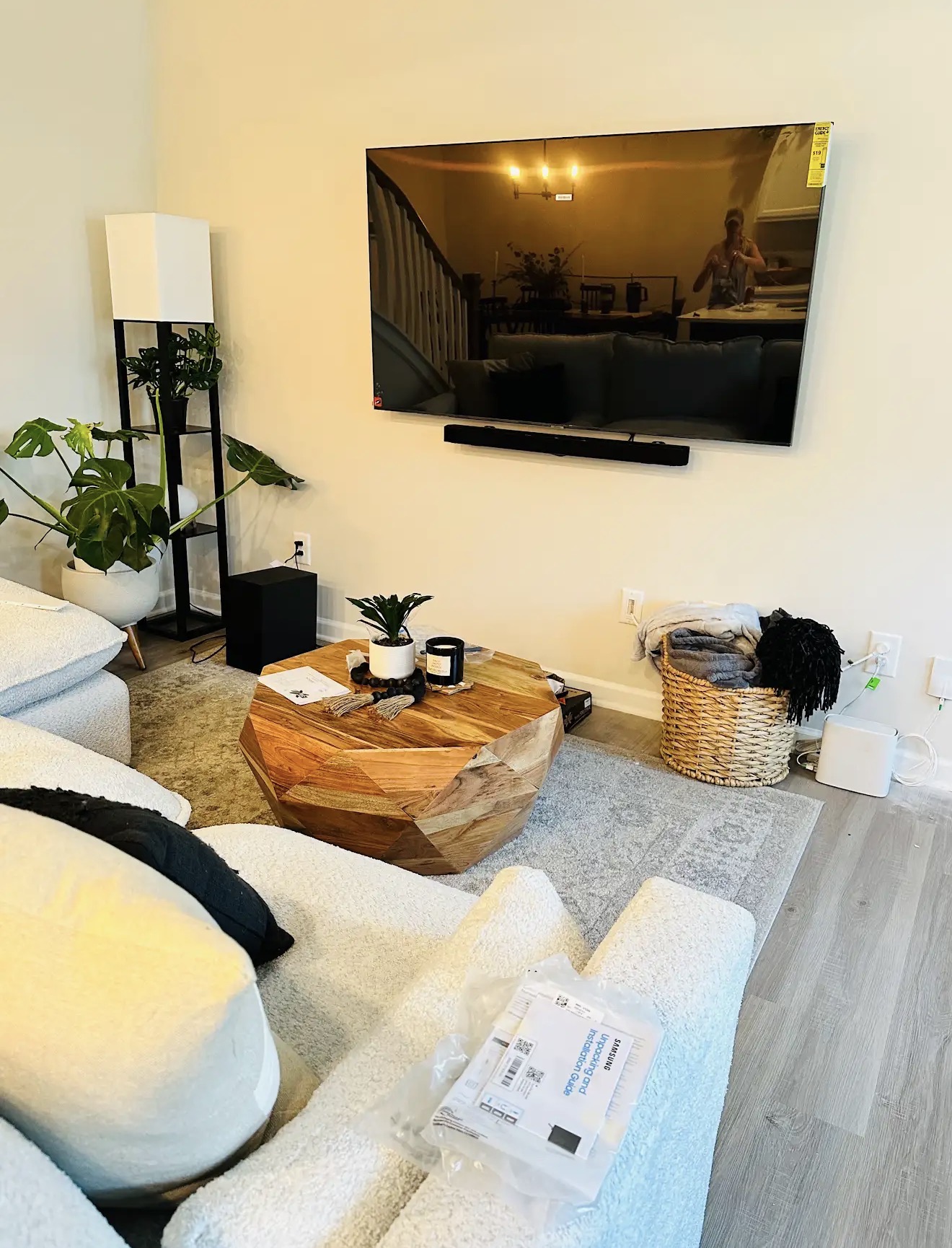 75-inch TV mounted on drywall with full-motion bracket in Marietta, GA living room