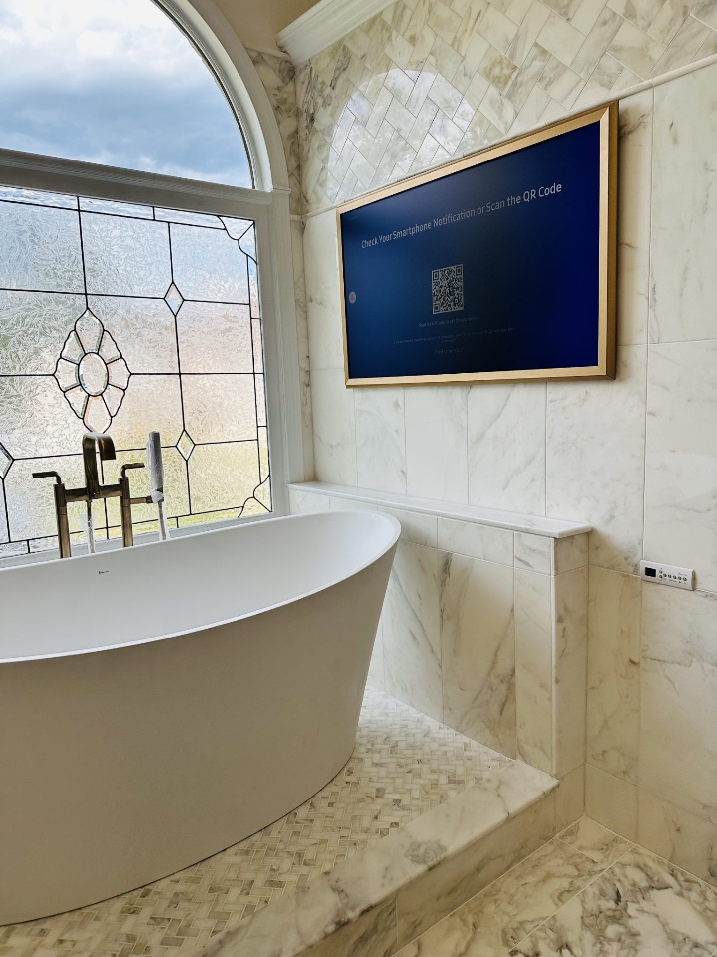 Professional Samsung Frame TV installation displaying artwork in gallery style in Metro Atlanta home