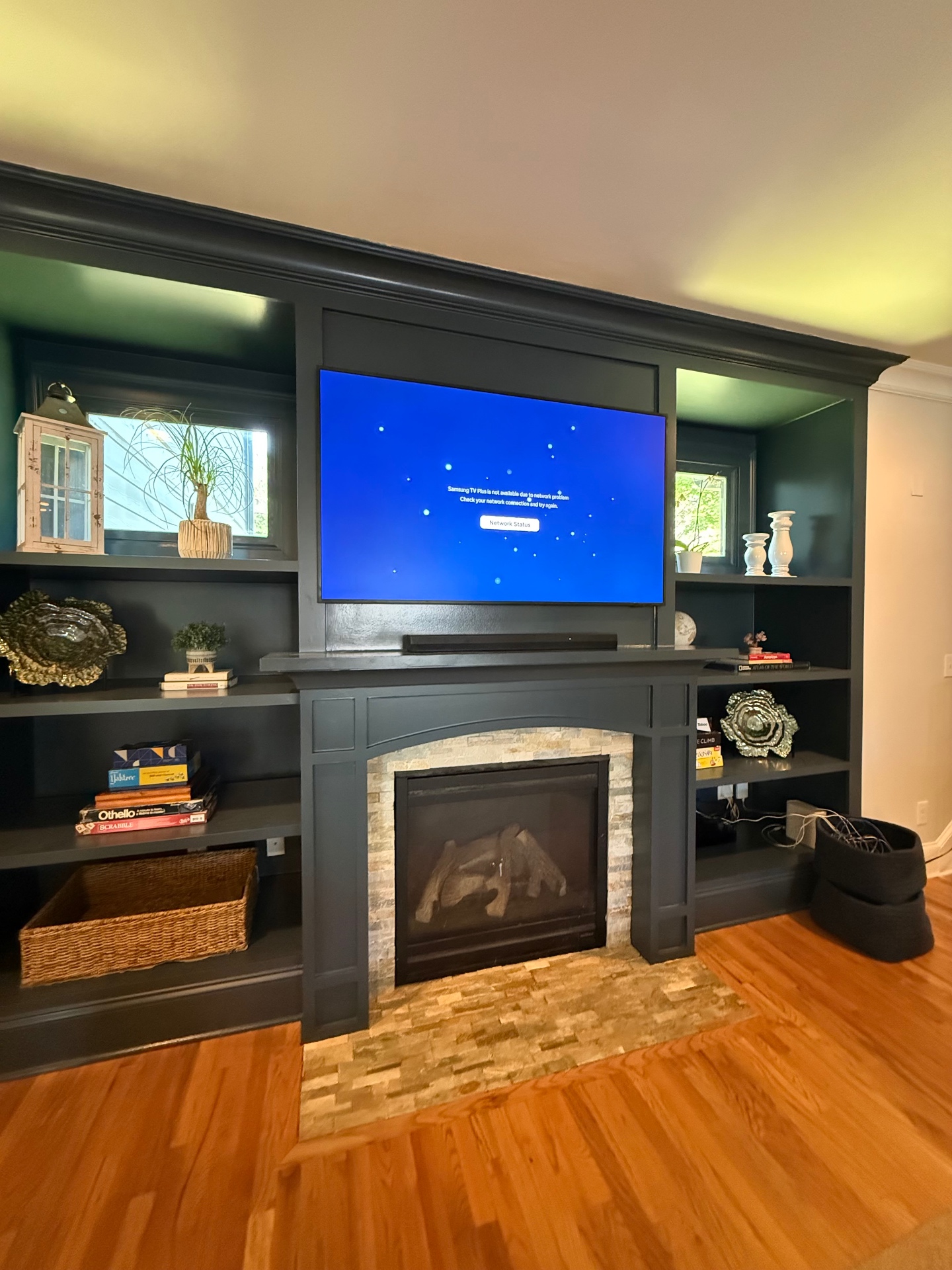 65-inch TV mounted on drywall in Decatur, GA