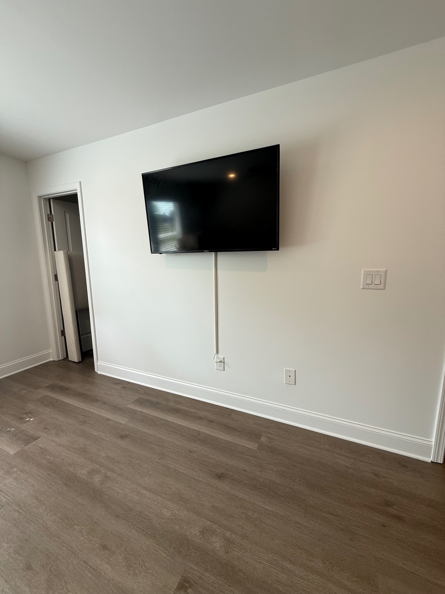 55-inch TV mounted on drywall in Buford, GA
