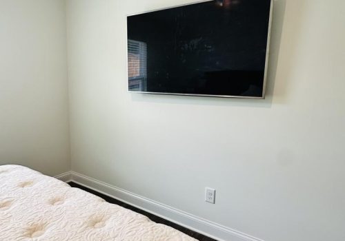 Enhancing Audio: How to Mount a Soundbar Above Your TV